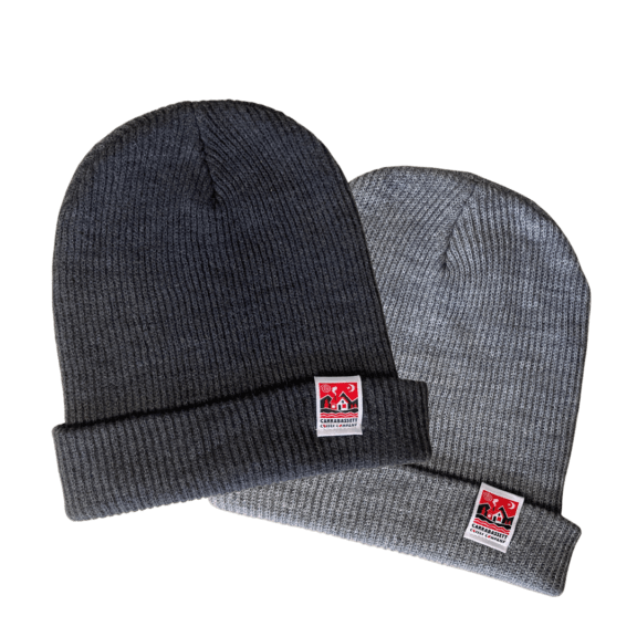 An image of both waffle-knit hats (dark gray and light gray) with brims folded. Little square Carrabassett Coffee logos on the brims.