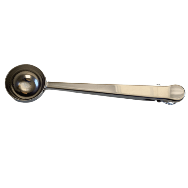 Stainless steel coffee scoop with a clip on the handle end. This image is scoop side up, so you cannot see the logo.