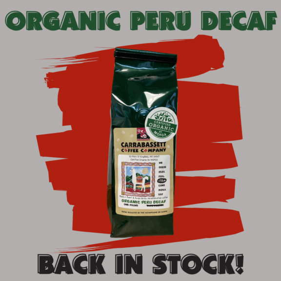 Text Reads: Organic Peru Decaf Back in Stock. There is also an image of a one pound bag of Organic Decaf Peru coffee.