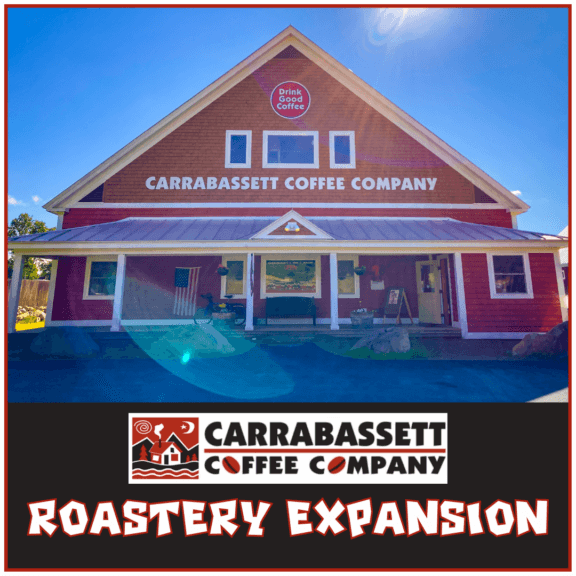 An image of the Carrabassett Coffee Company Roastery Building from the front with a lens flare from the sun in the blue sky. Below that, the words "Carrabassett Coffee Company Roastery Expansion" over a black background.