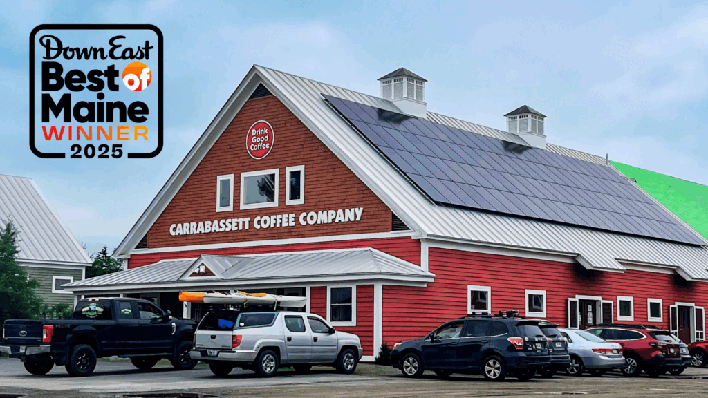 An image of the Carrabassett Coffee Company Roastery Building with the DOwneast Magazine Best of Maine Winner 2025 logo in the top corner.
